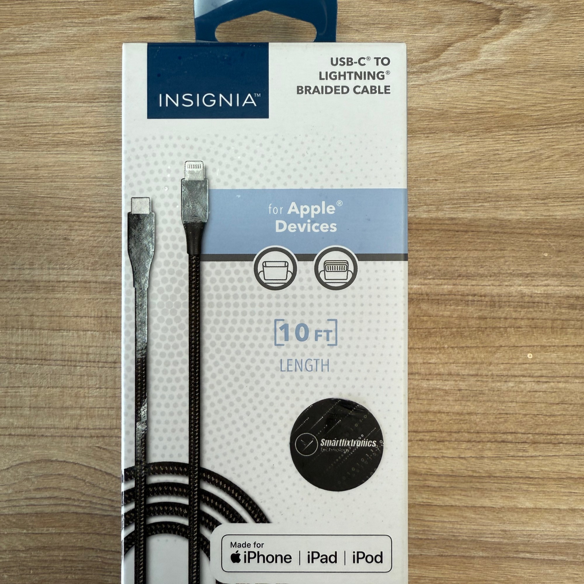 Insignia braided USB-C to Lightning 10-foot cable packaging for Apple devices with Smartfixtronics seal.