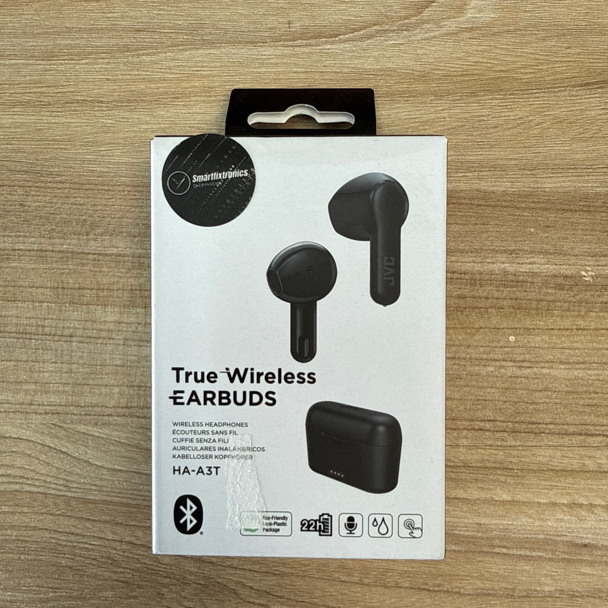 “JVC True Wireless Earbuds, model HA-A3T, black, with Smartfixtronics seal.”